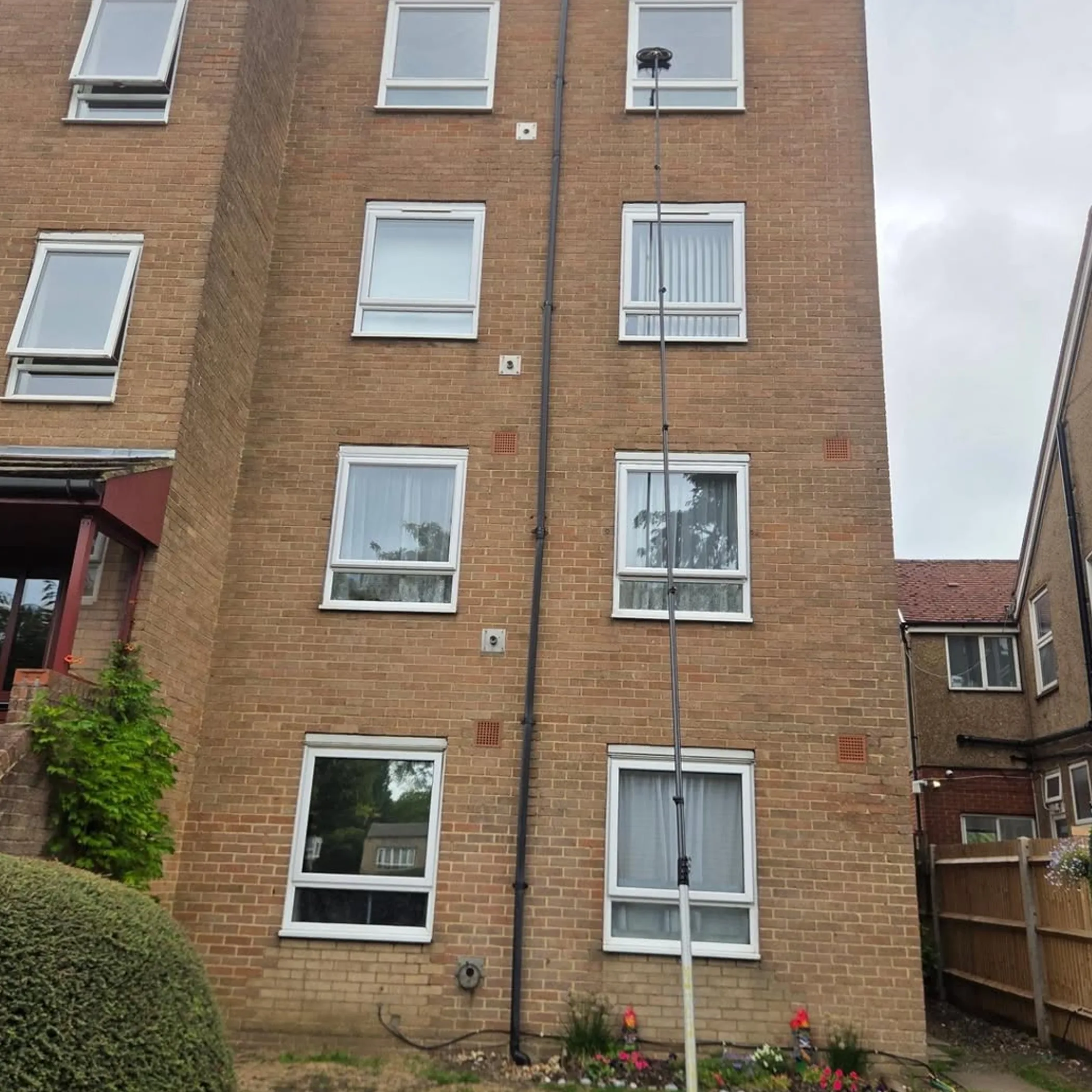 residential building with window-cleaning equipment