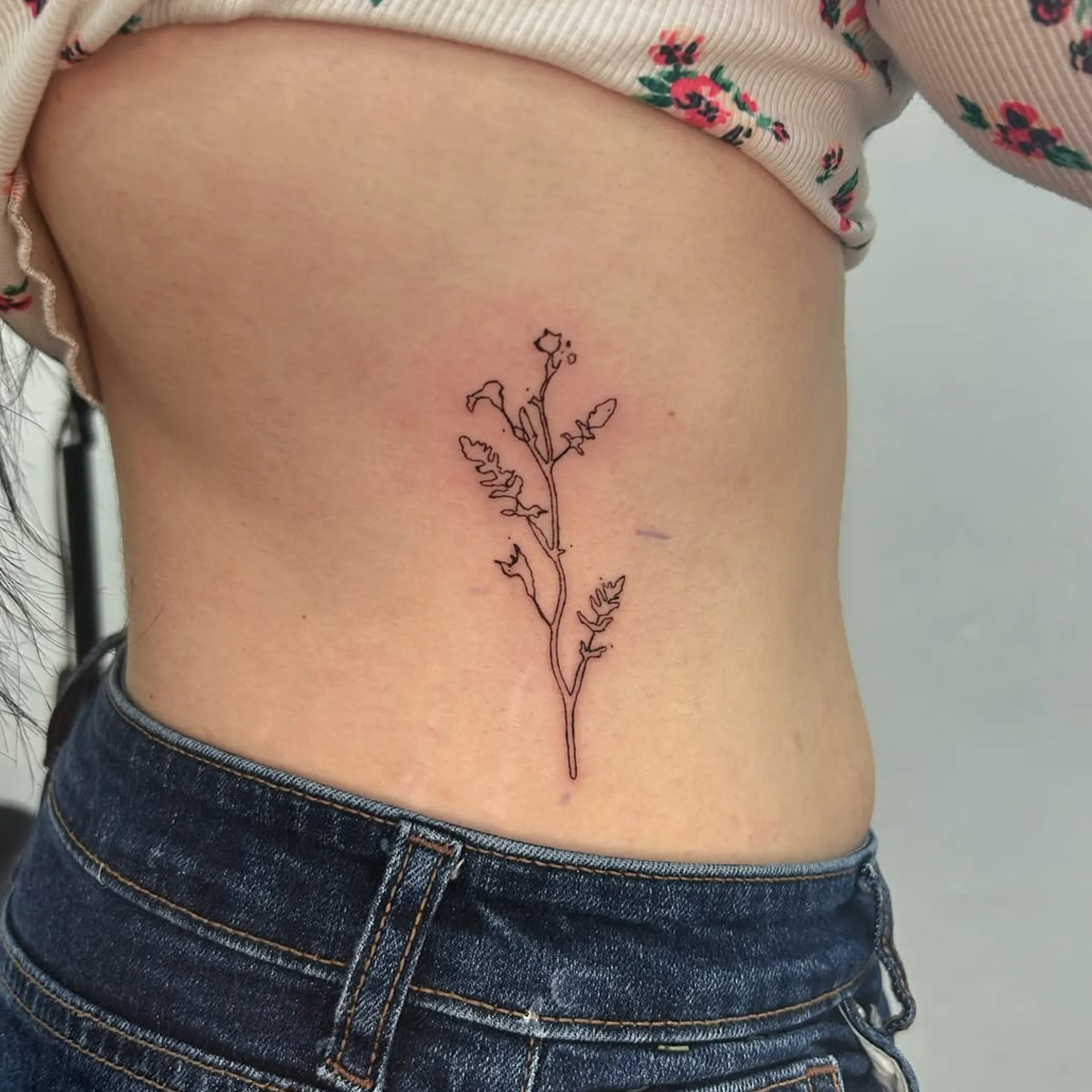 delicate floral tattoo