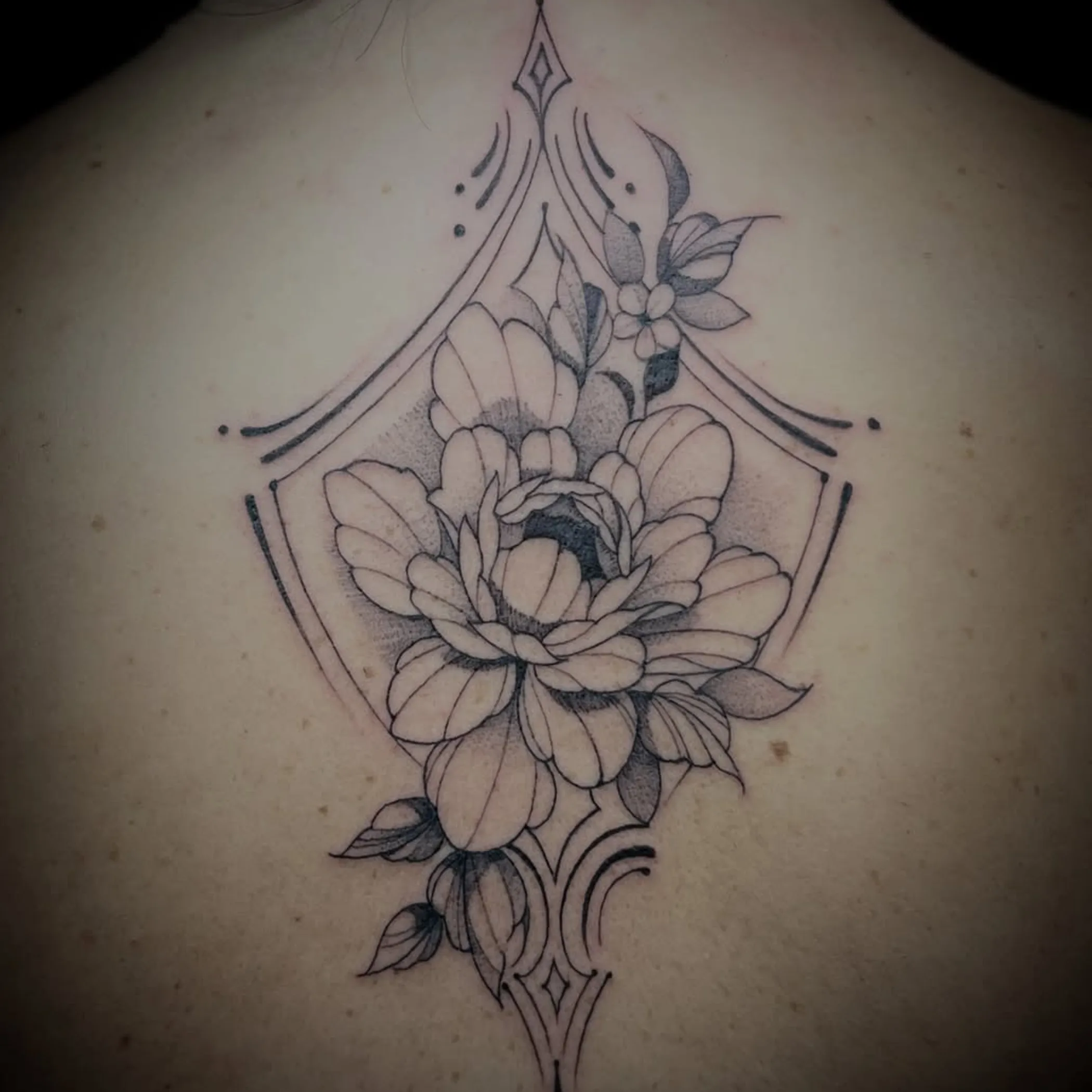detailed flower tattoo