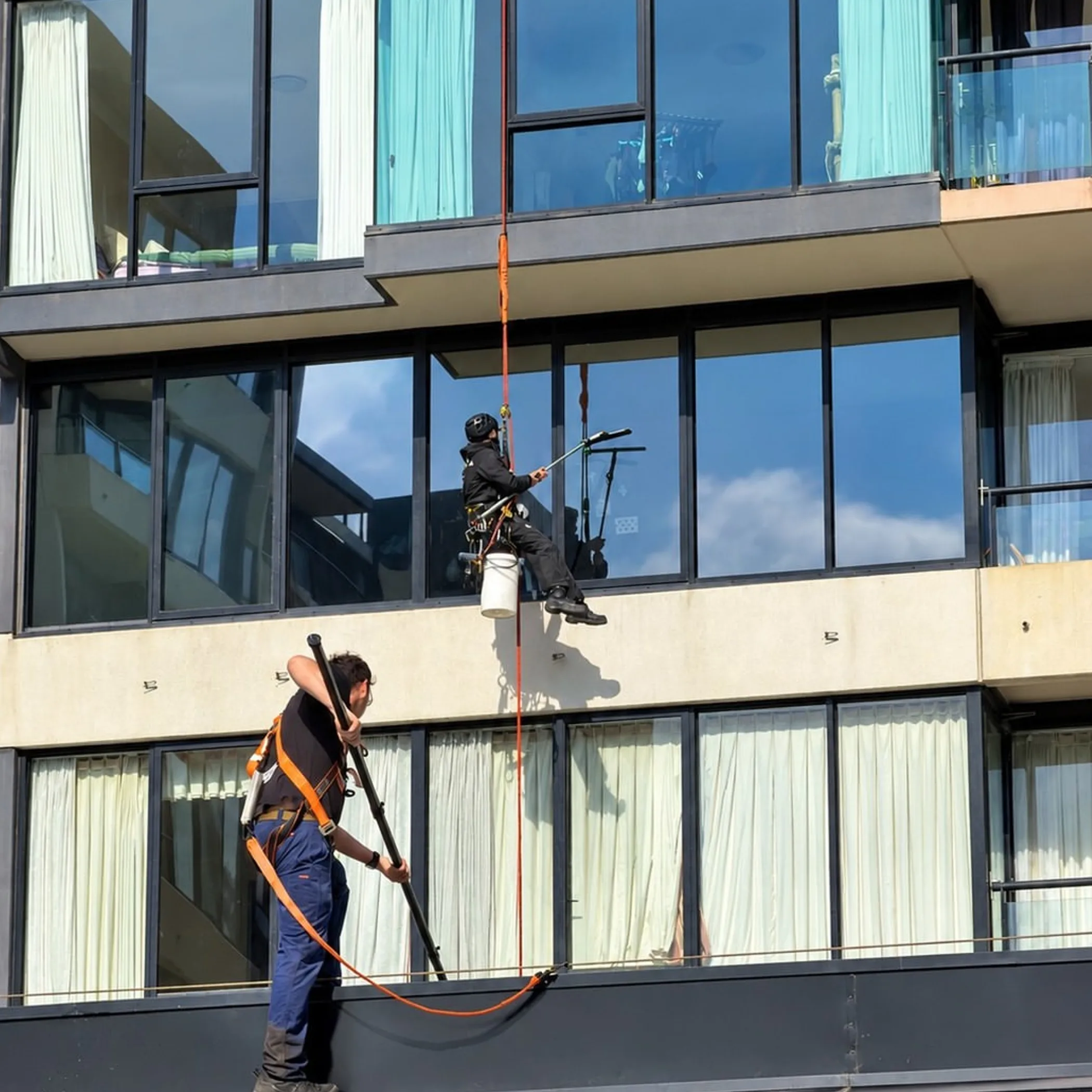 workers performing rope access maintenance